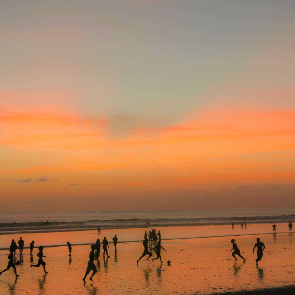 lots of tourist choose kuta beach to see beautiful sunset in bali